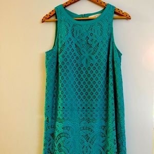 Green dress by Loft, size 8. Sleeveless and above the knee.